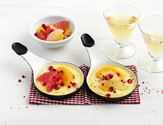 Raclette with pomegranate and citrus fruits