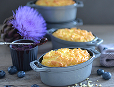 Couscous gratiné au fromage à raclette et sauce aux myrtilles 