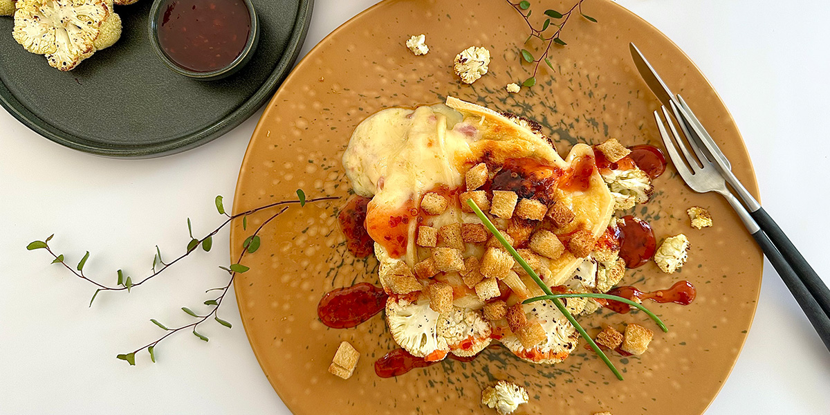 Ofen-Blumenkohl mit Raclettekäse Ofen-Blumenkohl mit Raclettekäse